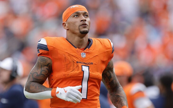 Evan Engram before the Broncos-Titans game Week 1. He's wearing the Broncos home orange and an orange headband.