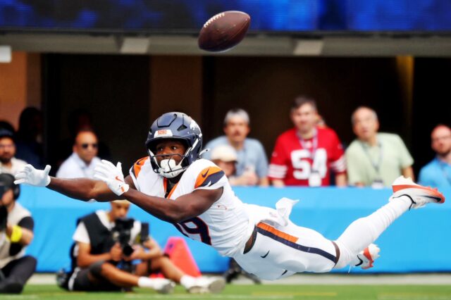 Marvin Mims lays out for a pass in the end zone that Bo Nix overthrew.
