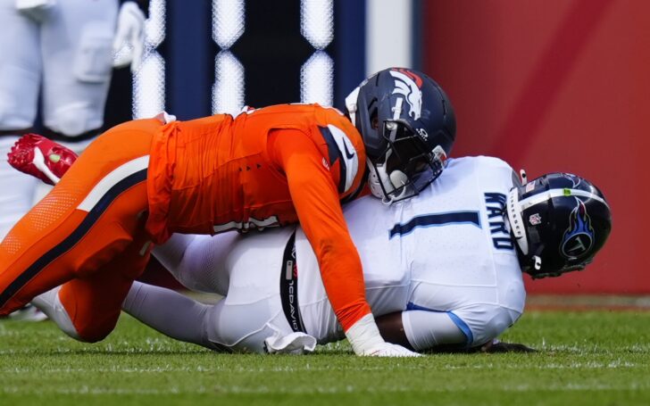 Nik Bonitto sacks Cam Ward in Week 1.