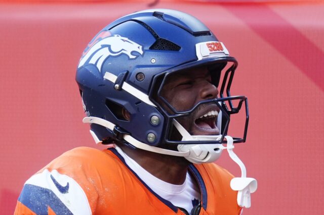 Marvin Mims celebrates his career-long 70-yard punt return against the Chiefs.